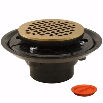 Picture of 2" x 3" ABS Shower Drain with 2" ABS Spud and 4" Round Polished Brass Cast Strainer with Test Plug